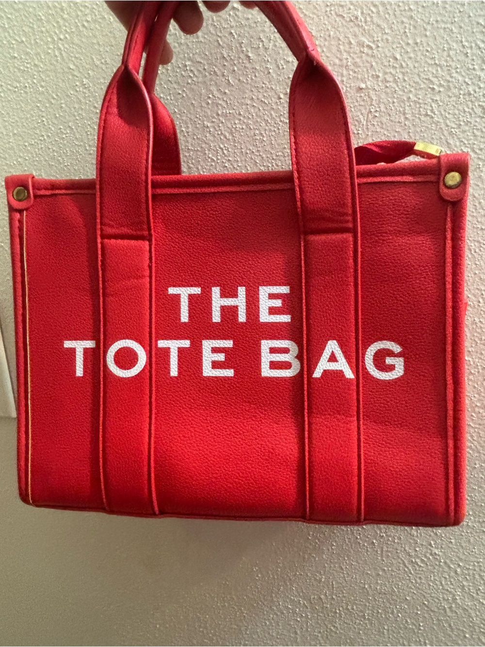 Red Canvas Tote Bag with 'THE TOTE BAG' Text